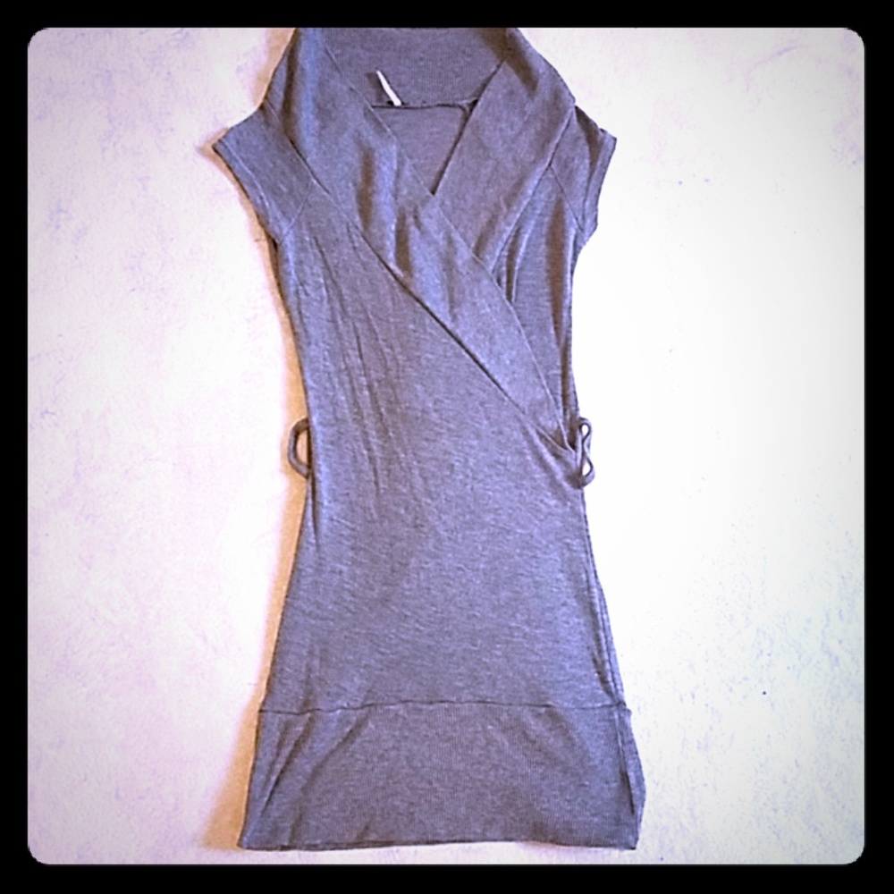 Grey low cut dress with slots for large belt